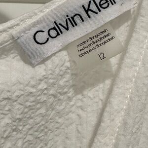 Calvin Klein jumpsuit romper chiffon material in  white